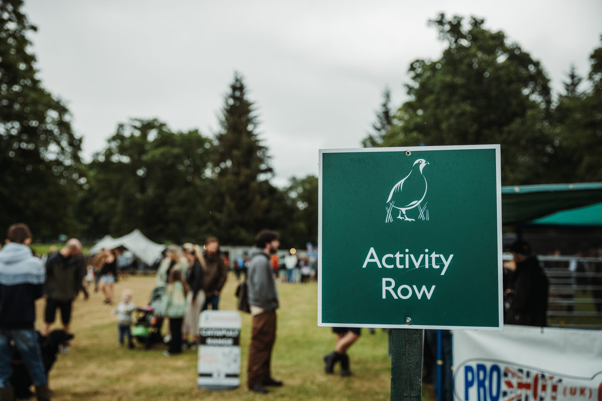 Scottish_Game_Fair_2024-6902 A sign at the Scottish Game Fair showing where the Activity Row is